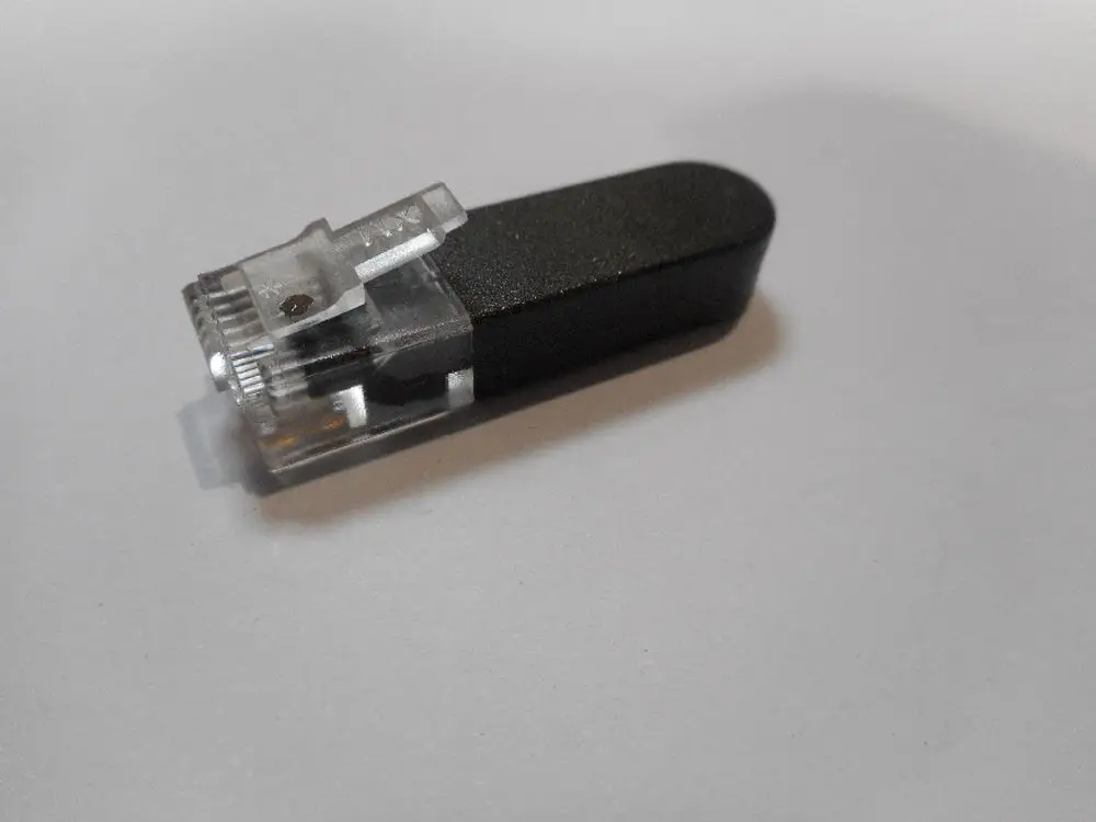 Endwiderstand in Schwarz mit transparentem Gehäuse, abgebildet auf einem weißen Hintergrund. Produkt von Remeha, zur Verwendung in S-Bus-Systemen.